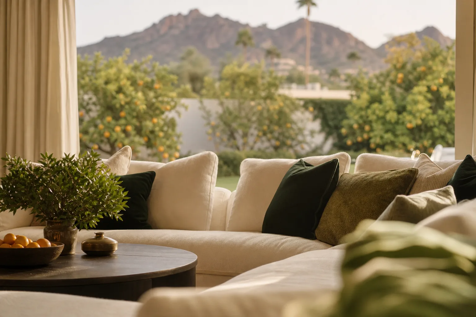 A lush green Arcadia neighborhood with citrus trees and Camelback Mountain